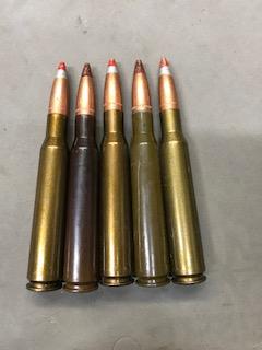 12.7 x 108mm loaded with 50BMG.jpg