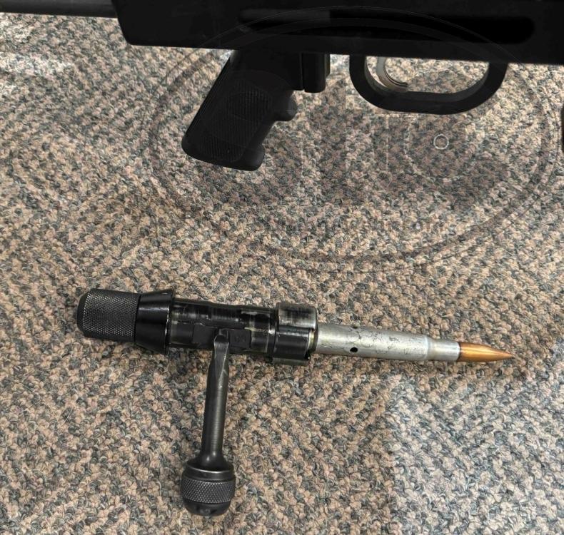Suppressed 50 BMG Rifle - Bolt & cartridge.jpg